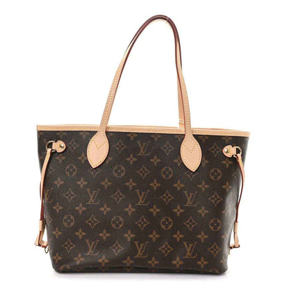 Louis Vuitton monogram canvas tote bag with vachetta leather handles, open top