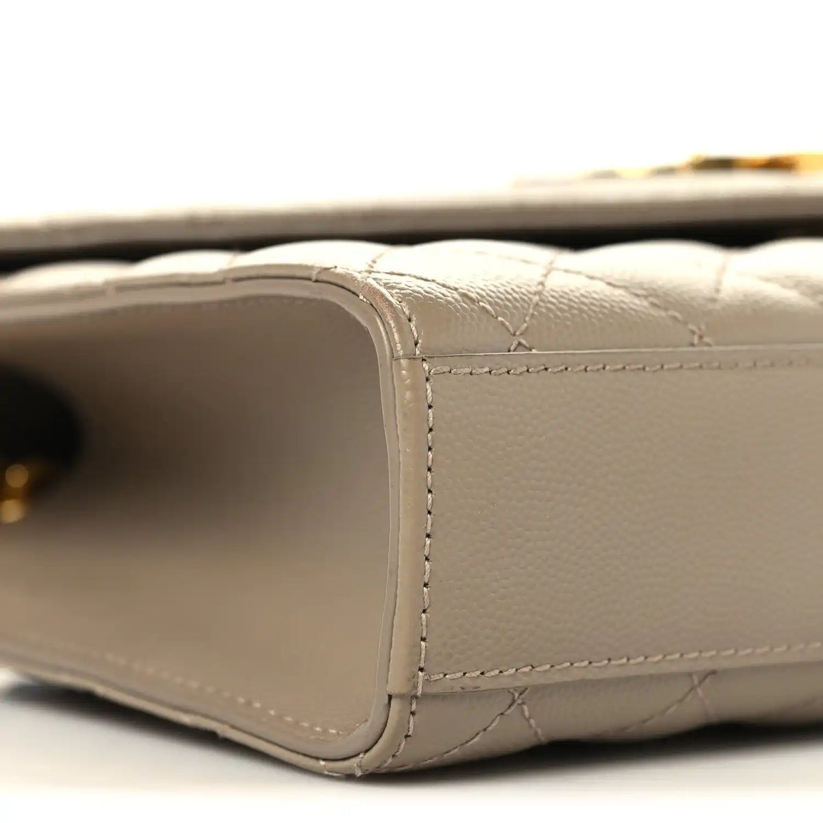 Dusty grey quilted satchel side with seam stitching and gold chain