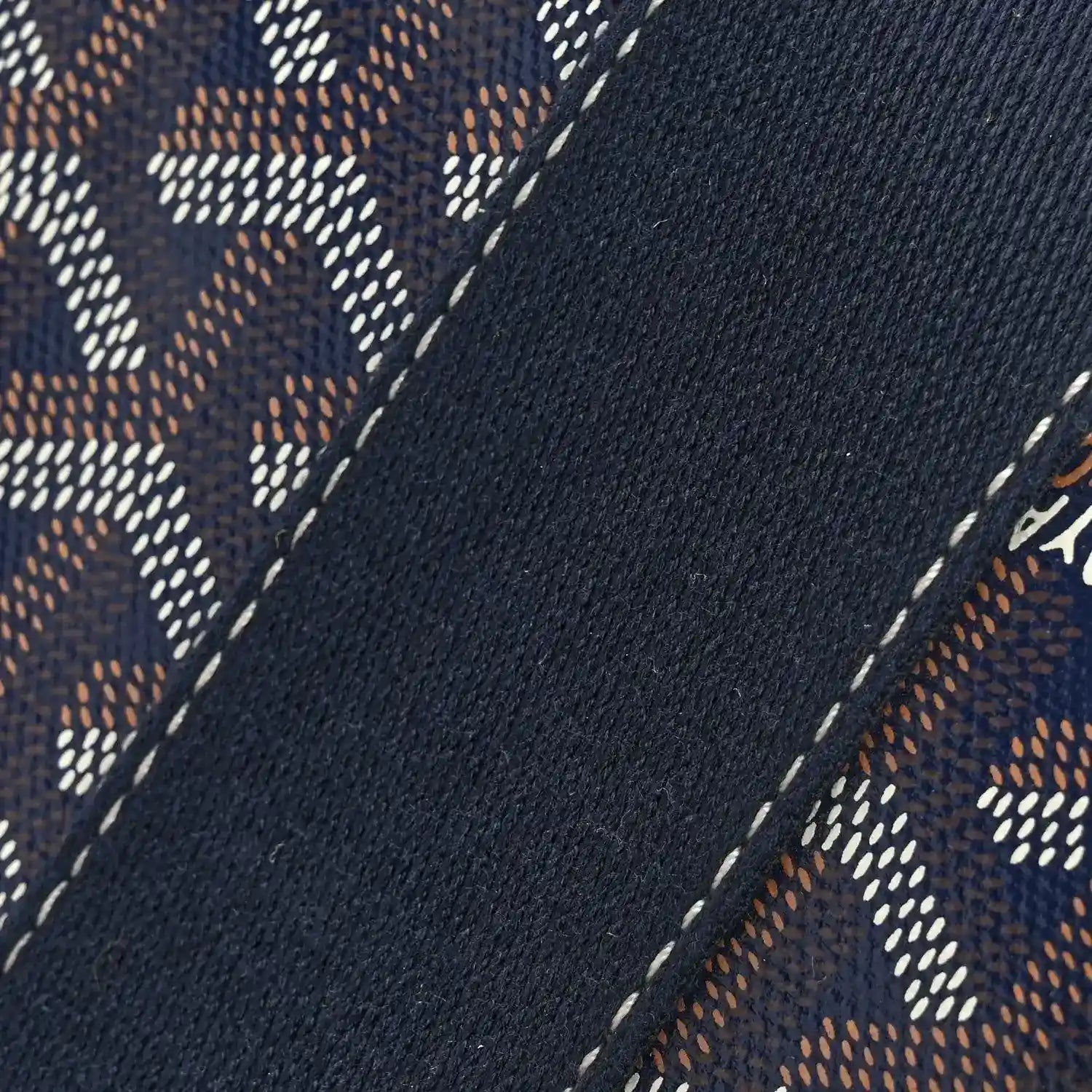 Navy patterned canvas panel with dotted motifs and white contrast stitching