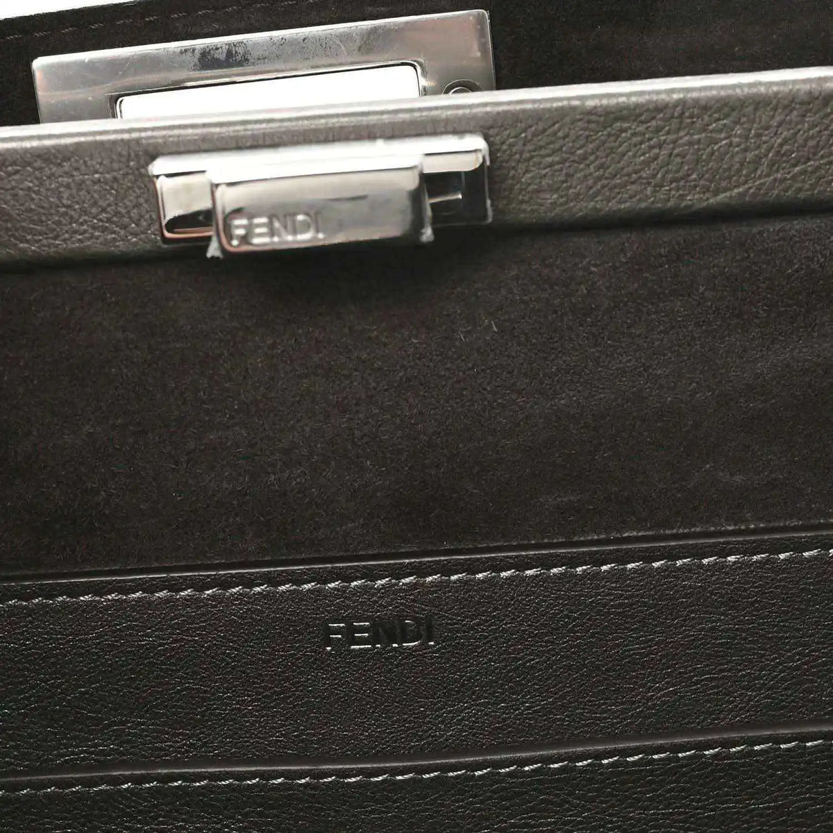 Fendi Peekaboo tote lining and logo stamp with metal turn-lock hardware
