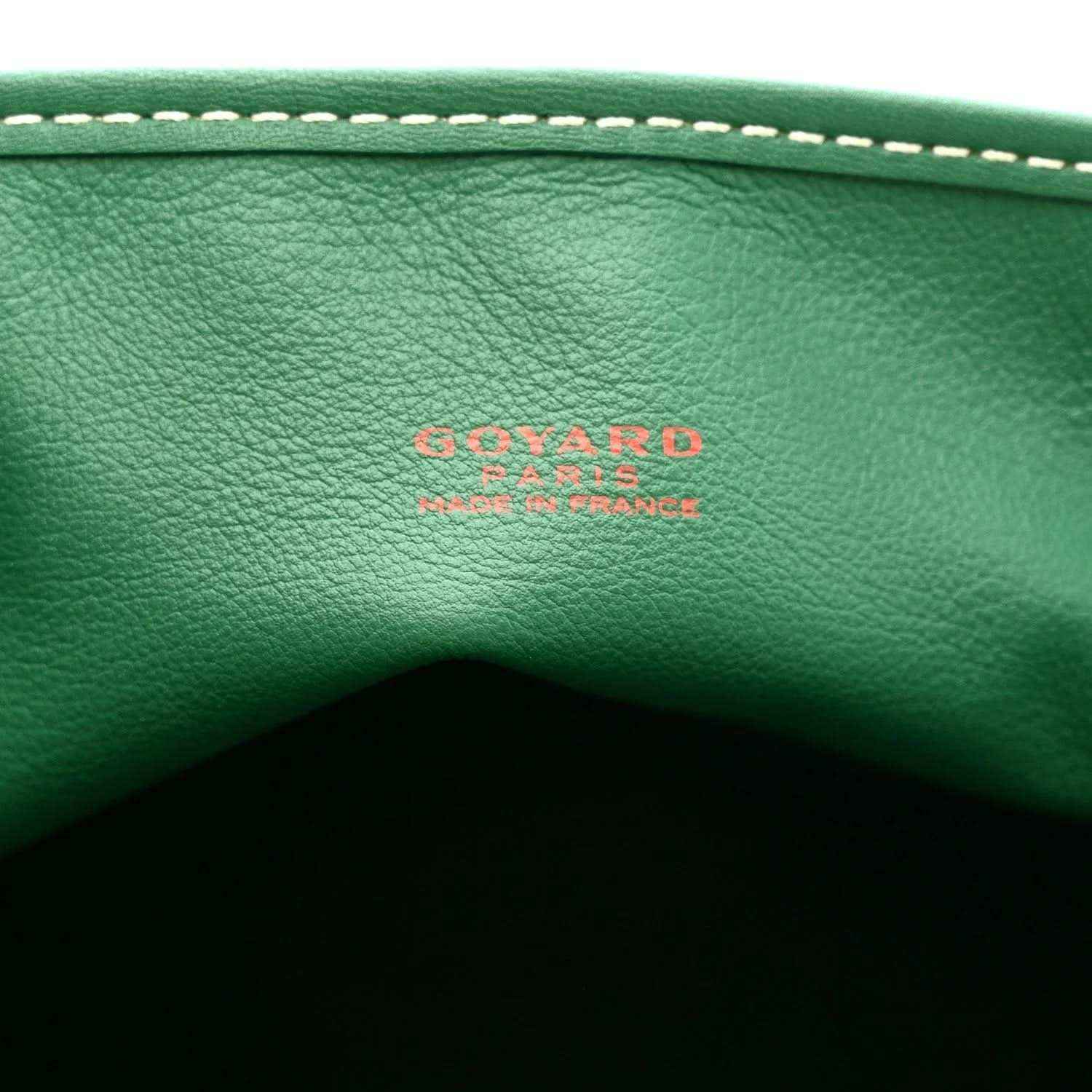Green leather tote bag panel with embossed Goyardine logo and contrast stitching