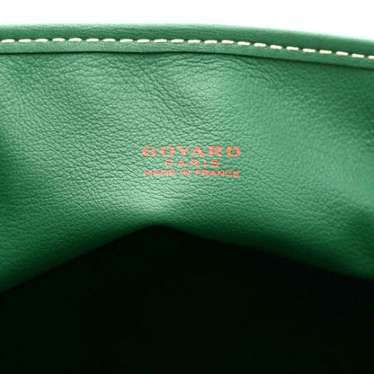Green leather tote bag panel with embossed Goyardine logo and contrast stitching