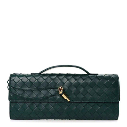 Emerald green intrecciato nappa long clutch bag with top handle and gold clasp