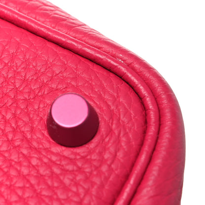 Rose pink textured calfskin bucket tote, with round metal lock detail on front