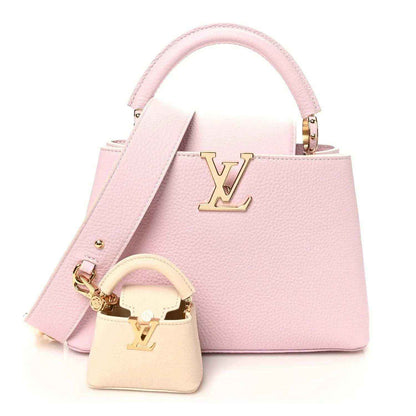 Guimauve pink leather Capucines BB handbag with top handle and gold LV clasp
