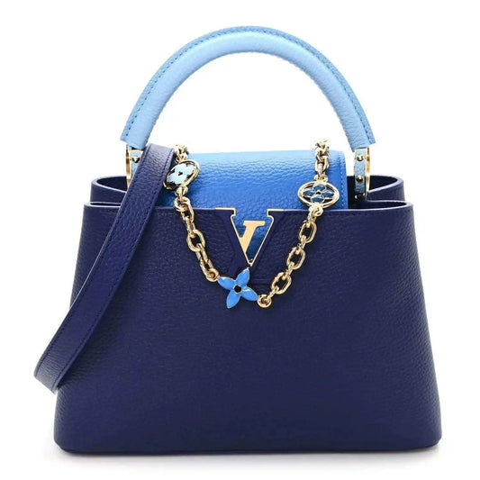 Blue Louis Vuitton Capucines BB handbag with chain strap and enamel flower charm