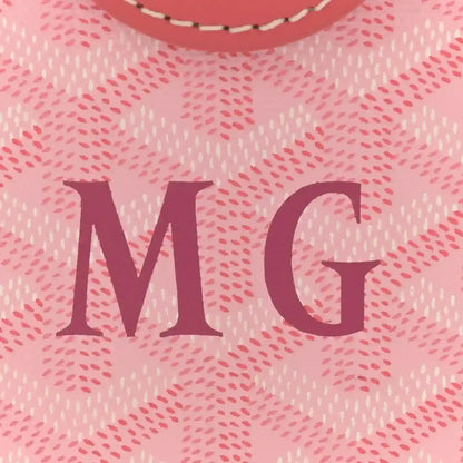 Pink canvas bag with large MG lettering