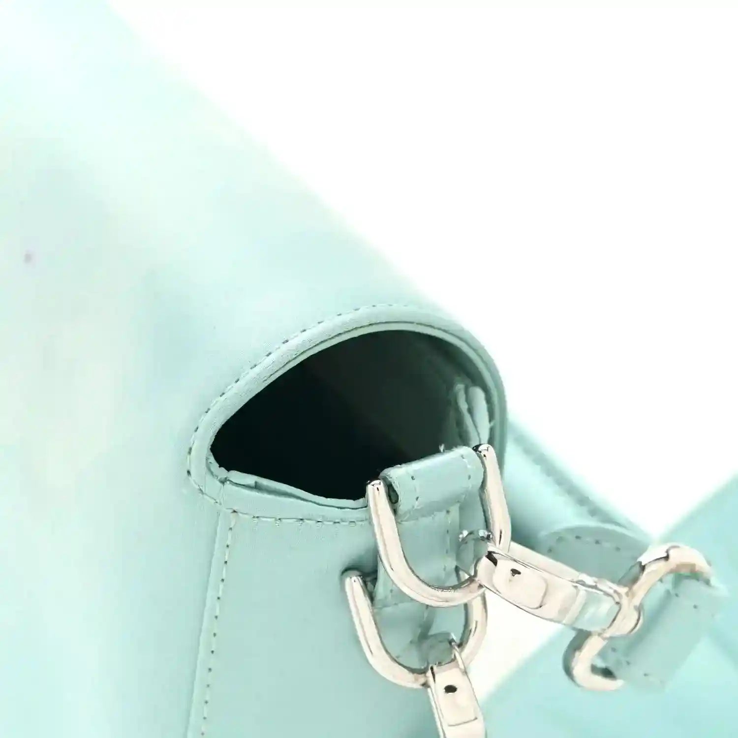 Light blue satin nappa baguette bag, silver-toned clasp and strap hardware