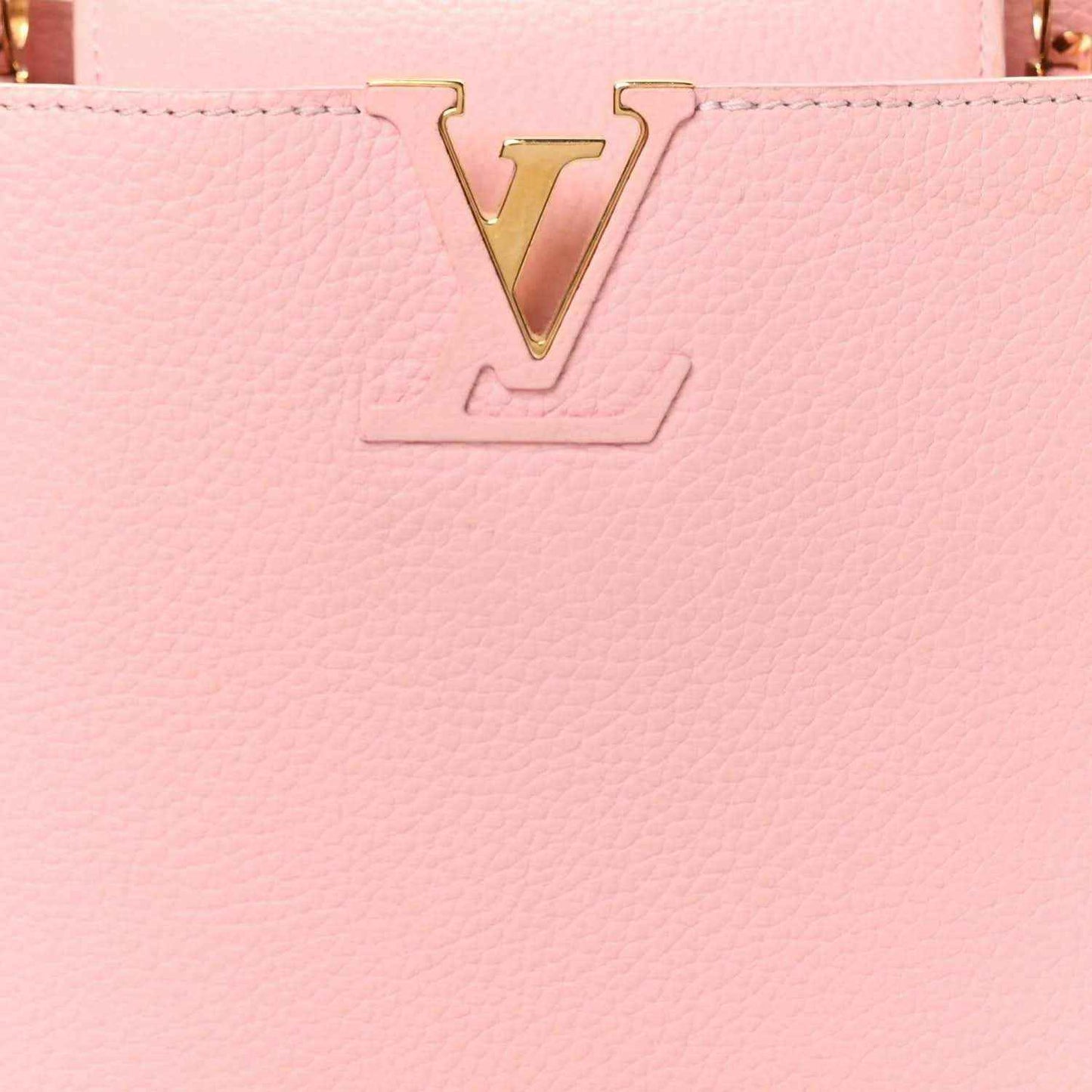 Bubble gum pink leather Capucines BB bag front with gold embossed V logo