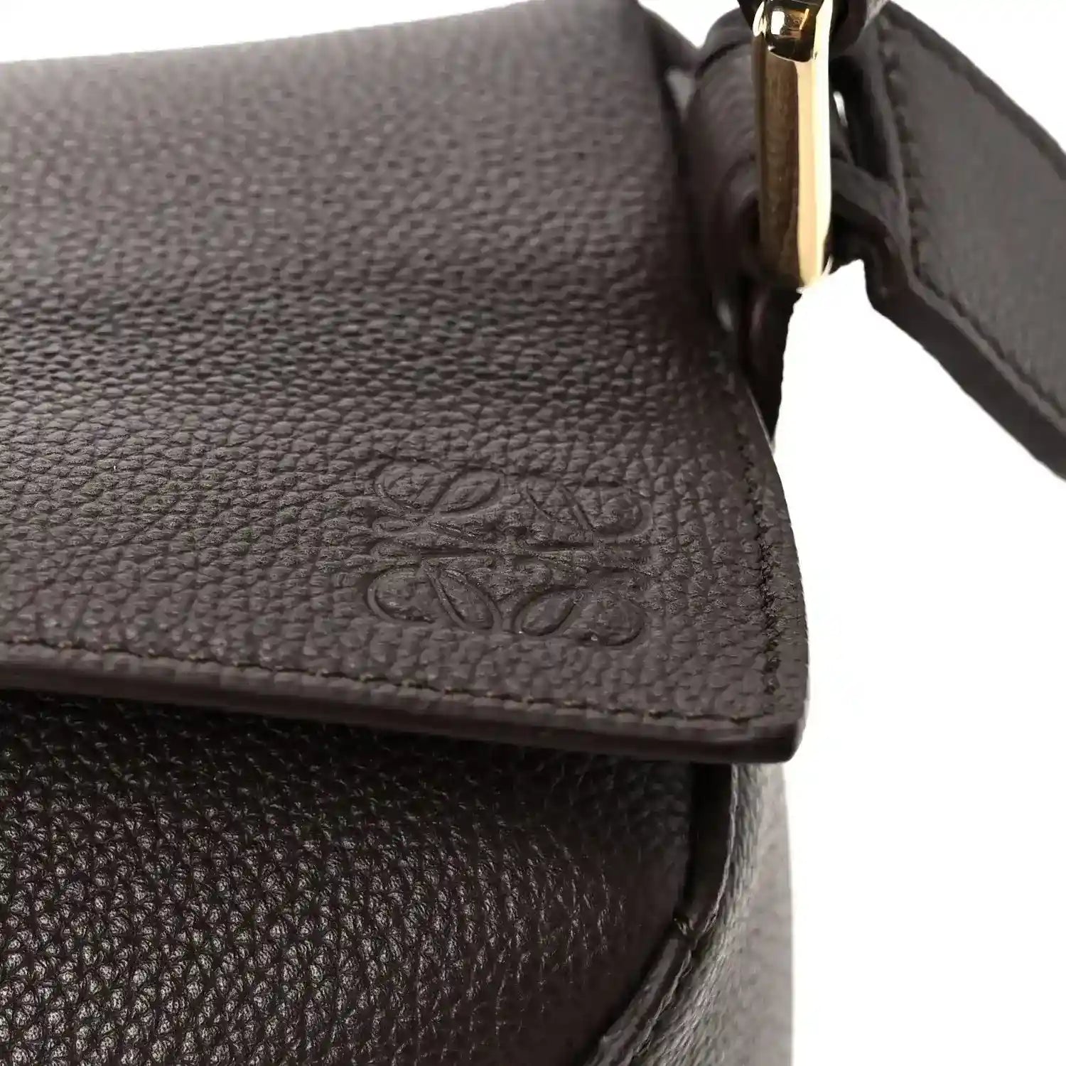 Dark chestnut grained leather flap with embossed “LOEWE” logo and gold-tone zipper