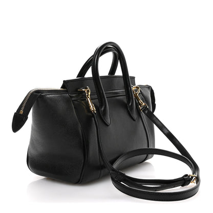 Celine black leather mini tote with top handles and crossbody strap