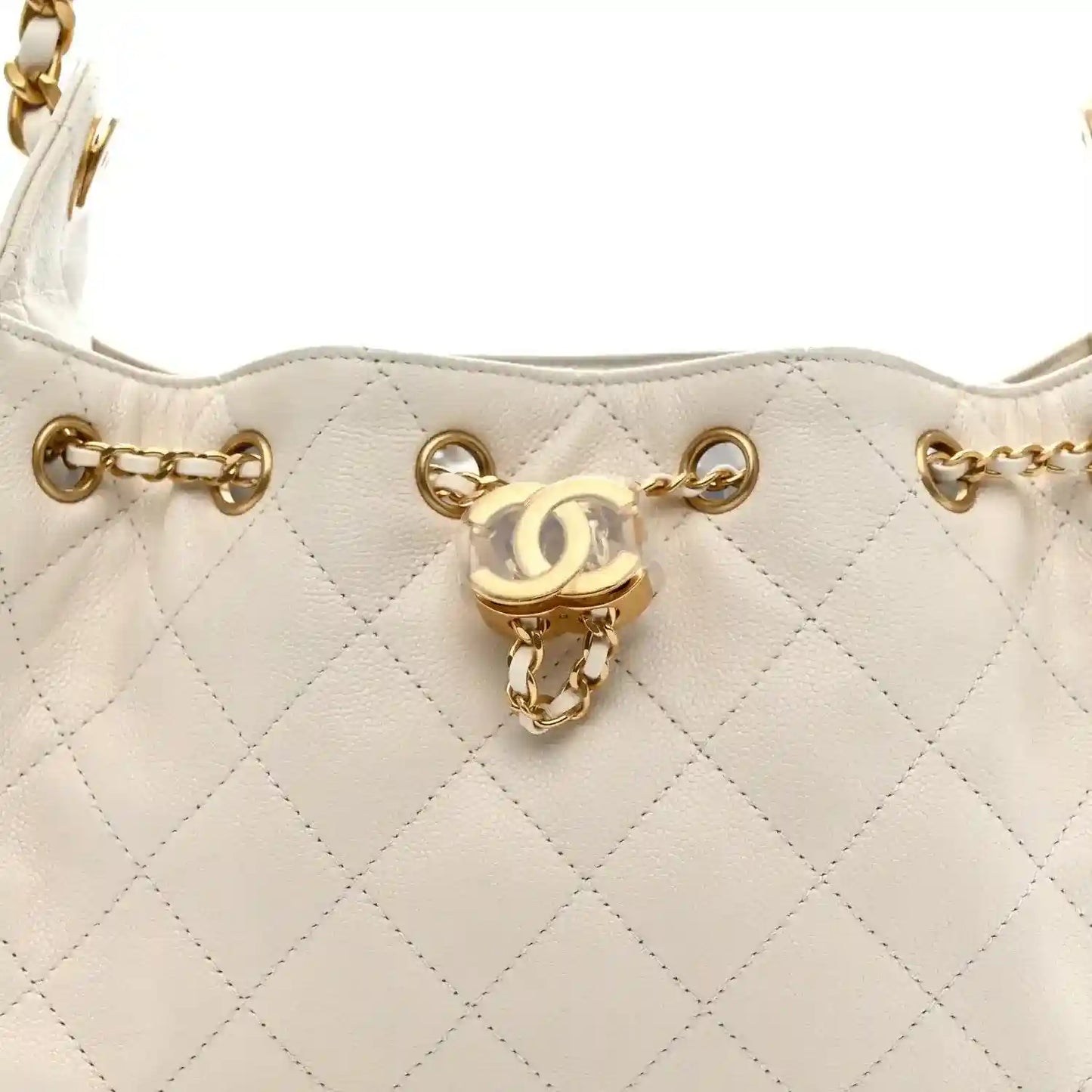 White quilted leather mini handbag front with gold-tone CC turn-lock and chain rings
