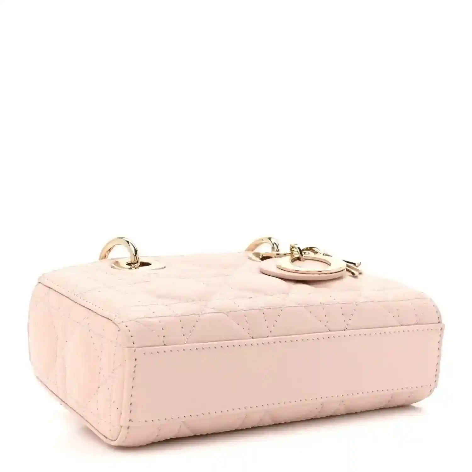 Pink quilted leather mini handbag with two top rings and gold-tone hardware