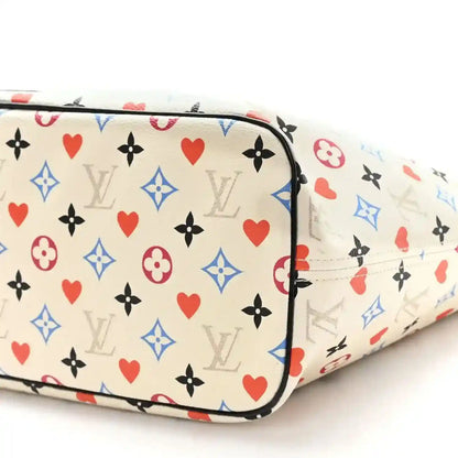 White Louis Vuitton zip-top monogram tote bag with colorful hearts and flowers pattern