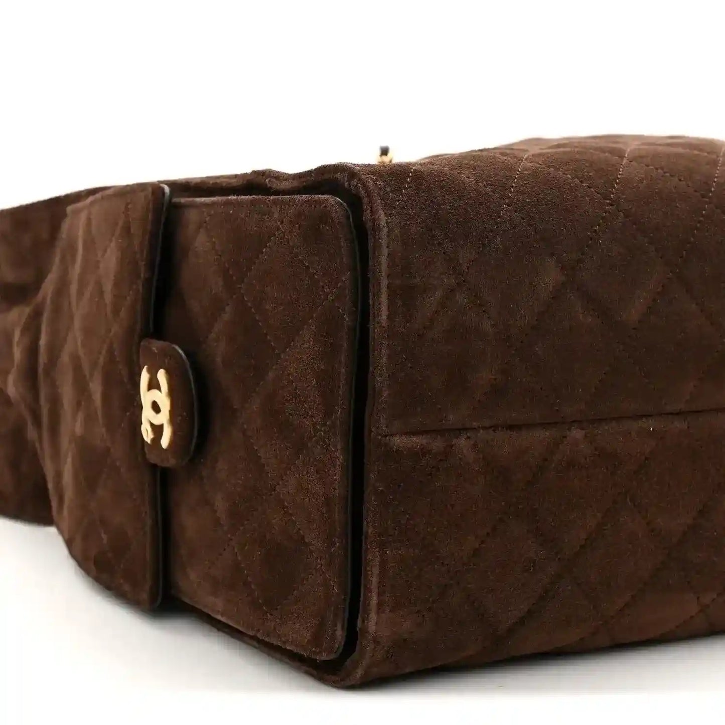 Dark brown suede quilted handbag end pocket with gold logo plaque