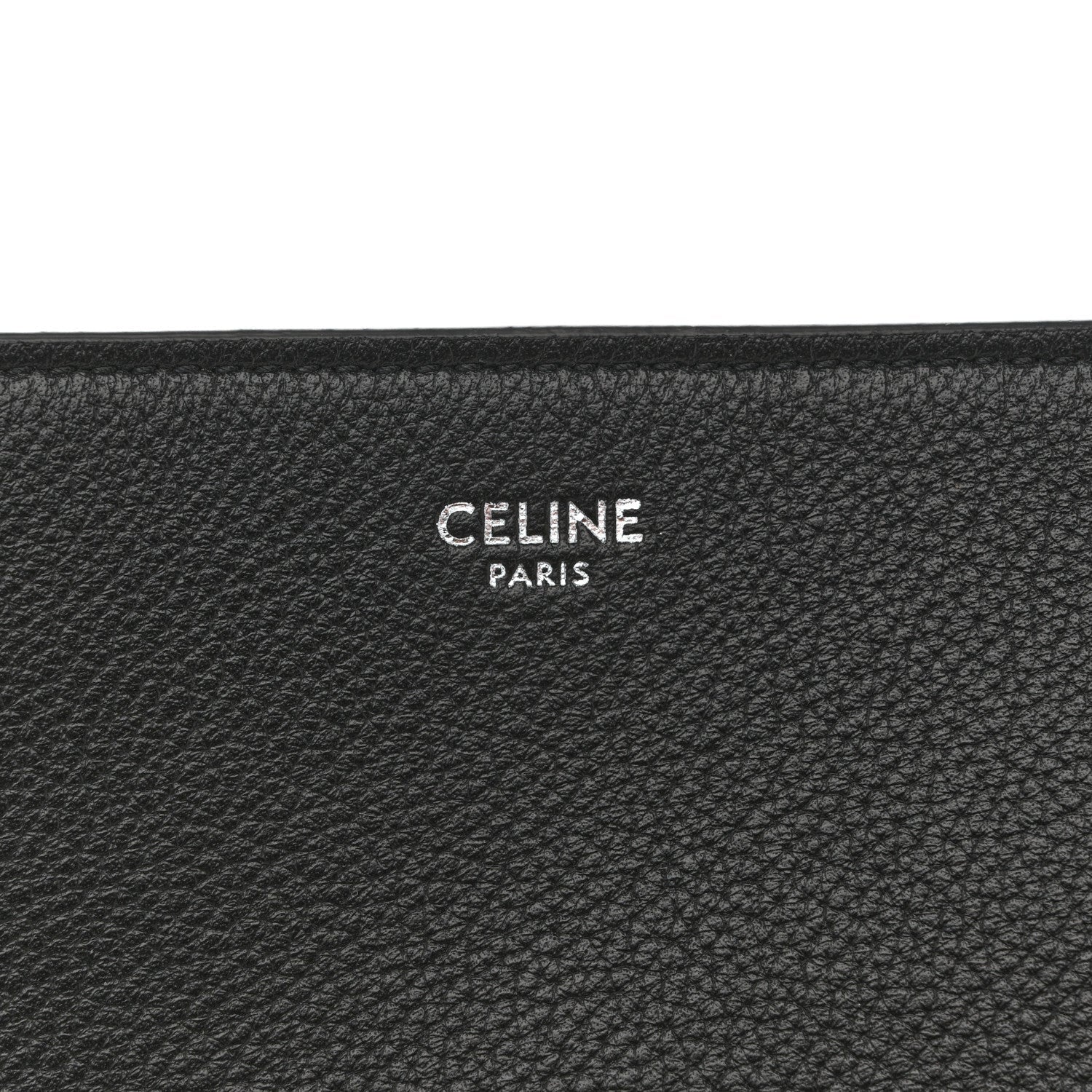 Black leather bag interior panel with CELINE PARIS embossed logo