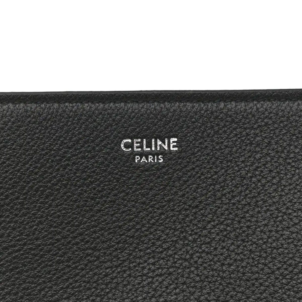 Black leather bag interior panel with CELINE PARIS embossed logo