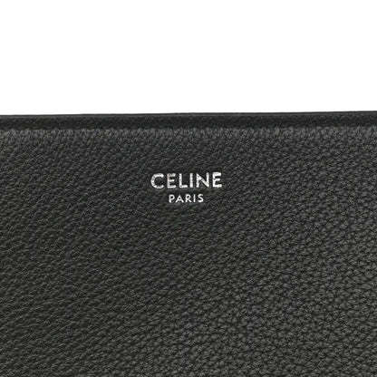 Black leather bag interior panel with CELINE PARIS embossed logo