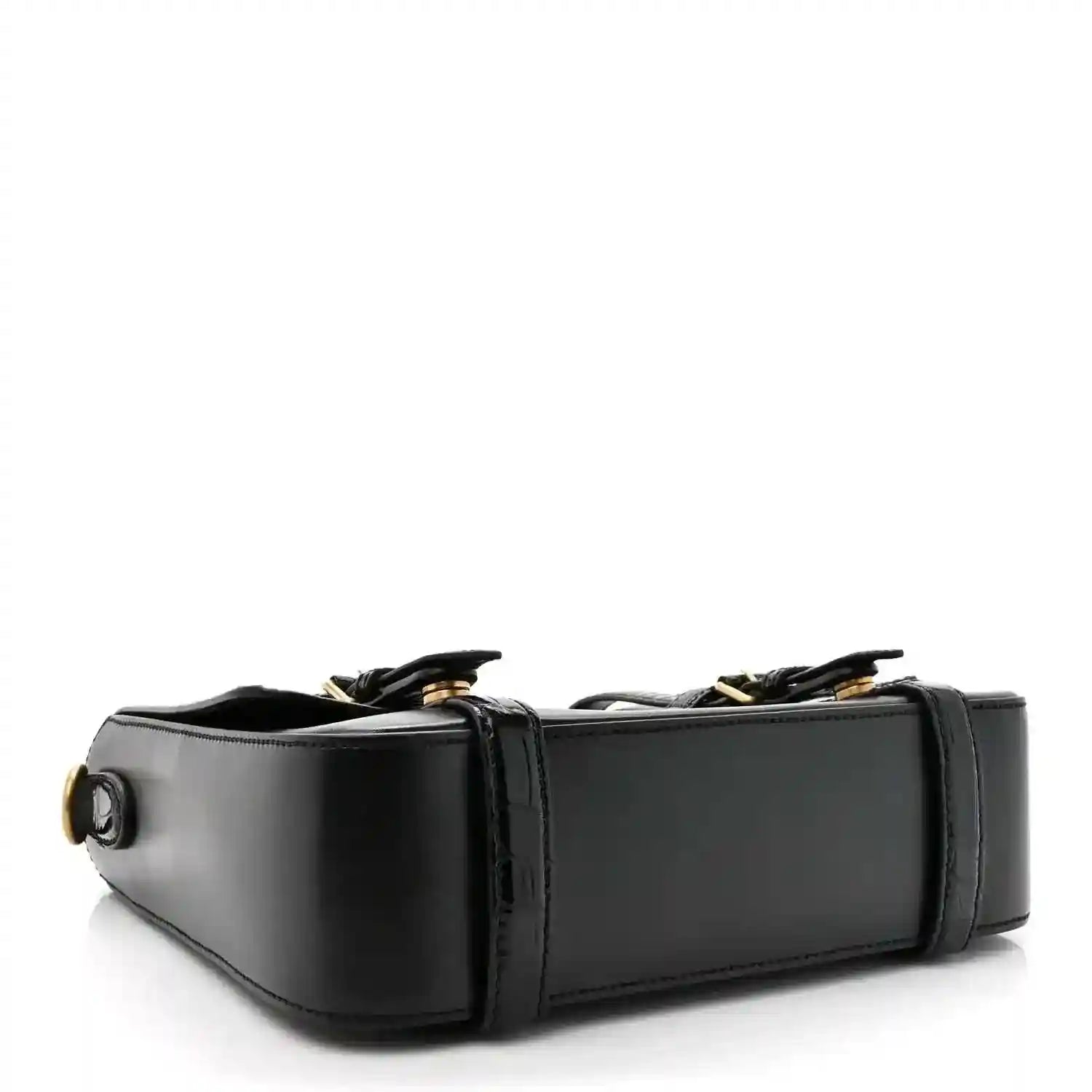 Black leather medium messenger bag with side profile and circular strap detail