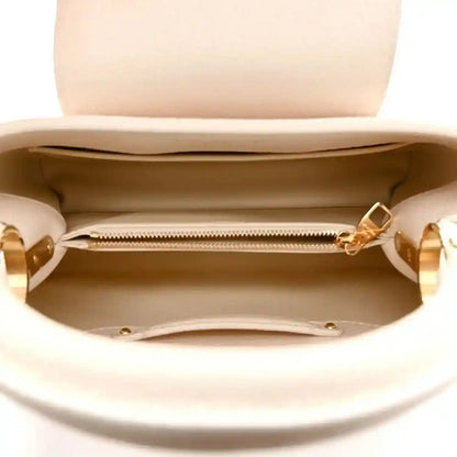 Louis Vuitton rattan handbag interior with zip closure and leather lining