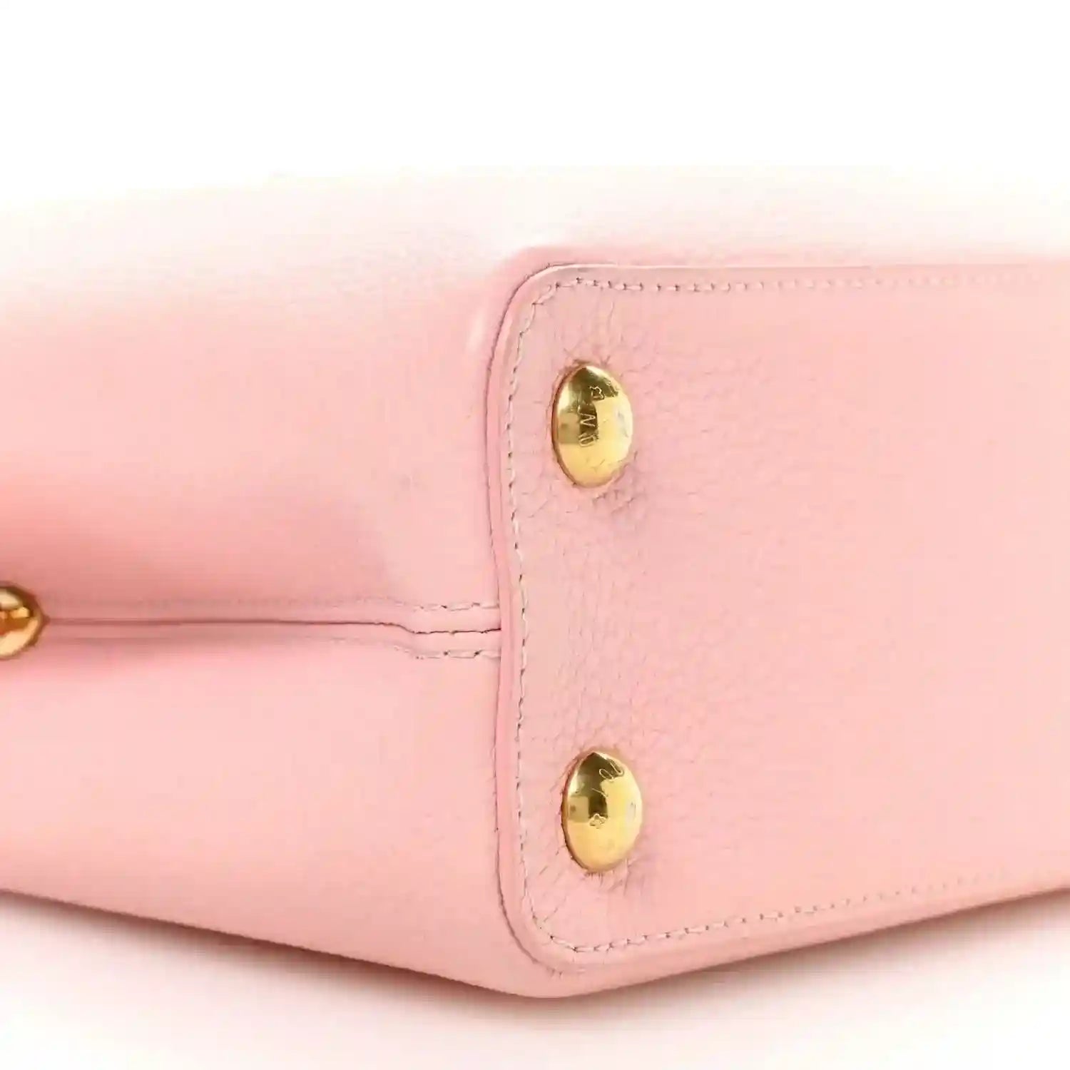 Bubble gum pink leather Capucines BB bag side corner with gold stud hardware