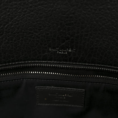 Black leather satchel interior logo patch and stitched zipper top