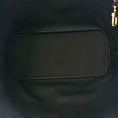 Black leather tote interior pocket with rounded stitched border