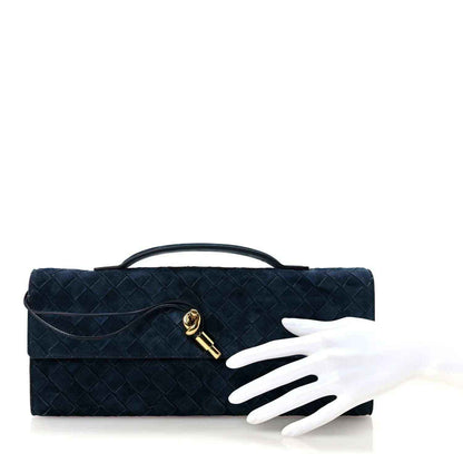 Blue suede intrecciato top-handle clutch with gold clasp and handle