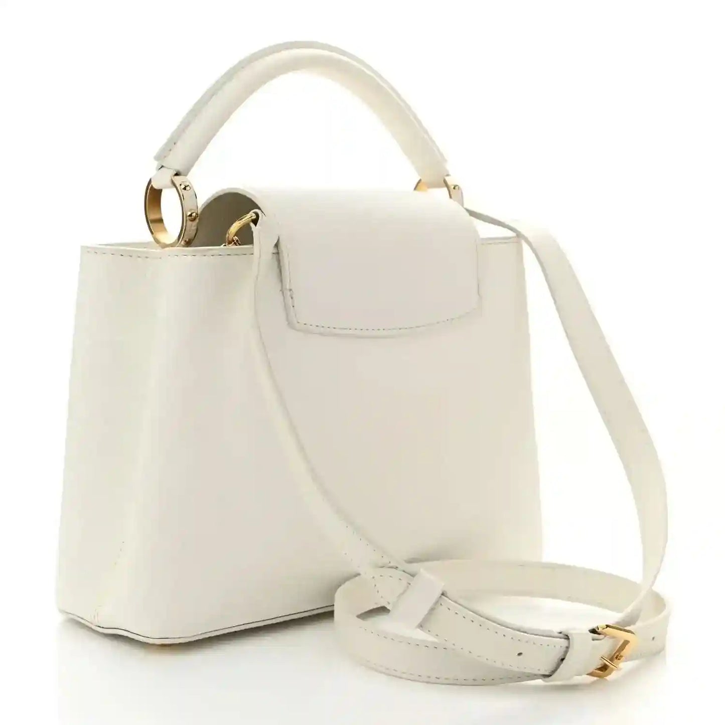White structured top-handle bag with flap, crossbody strap, and gold hardware