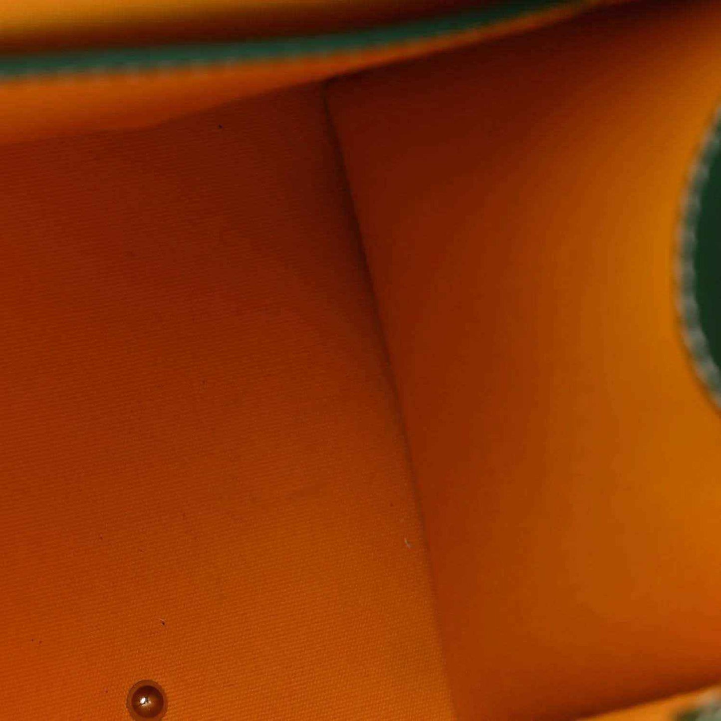 Goyardine Saigon PM bag interior lining in warm brown leather