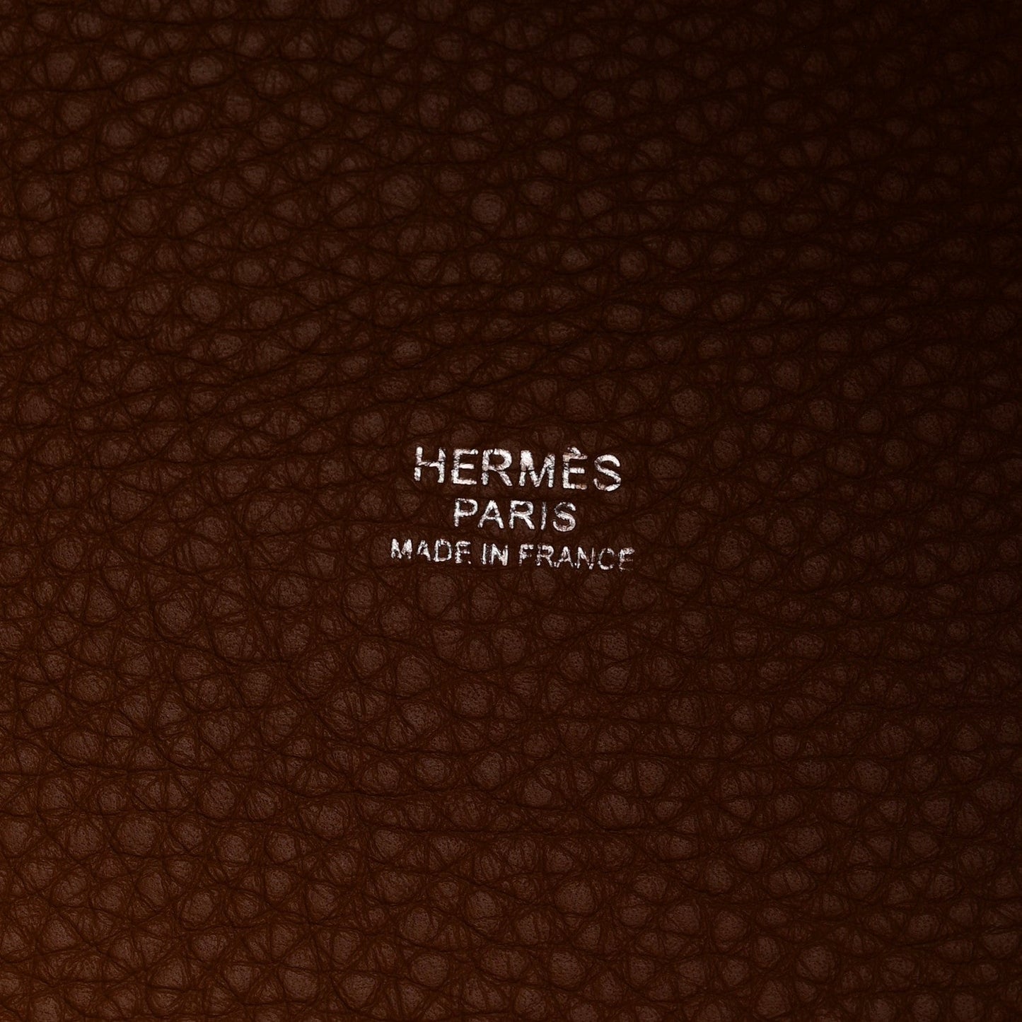 Brown leather interior lining with embossed HERMES PARIS MADE IN FRANCE