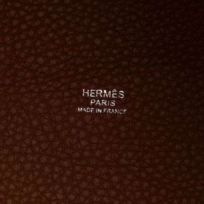 Brown leather interior lining with embossed HERMES PARIS MADE IN FRANCE