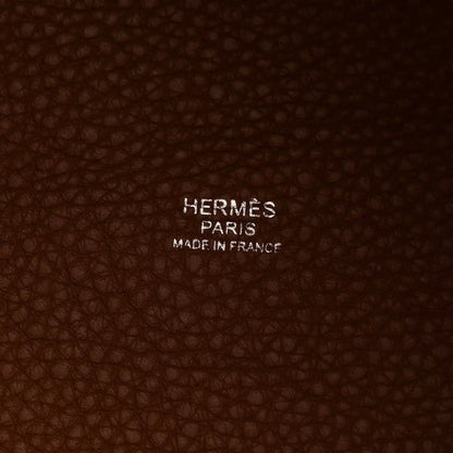 Brown leather interior lining with embossed HERMES PARIS MADE IN FRANCE