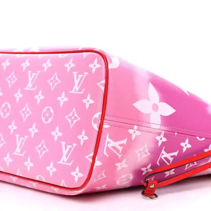 Pink Louis Vuitton monogram Escale Neverfull tote bag with white motifs, red trim and zipper pull
