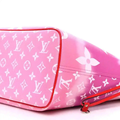 Pink Louis Vuitton monogram Escale Neverfull tote bag with white motifs, red trim and zipper pull