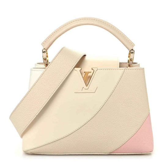 Tonal beige leather handbag with top handle, gold-tone hardware, front V emblem