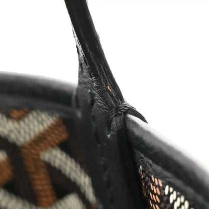 Mini Anjou reversible tote bag, close-up of black handle attachment with stitching