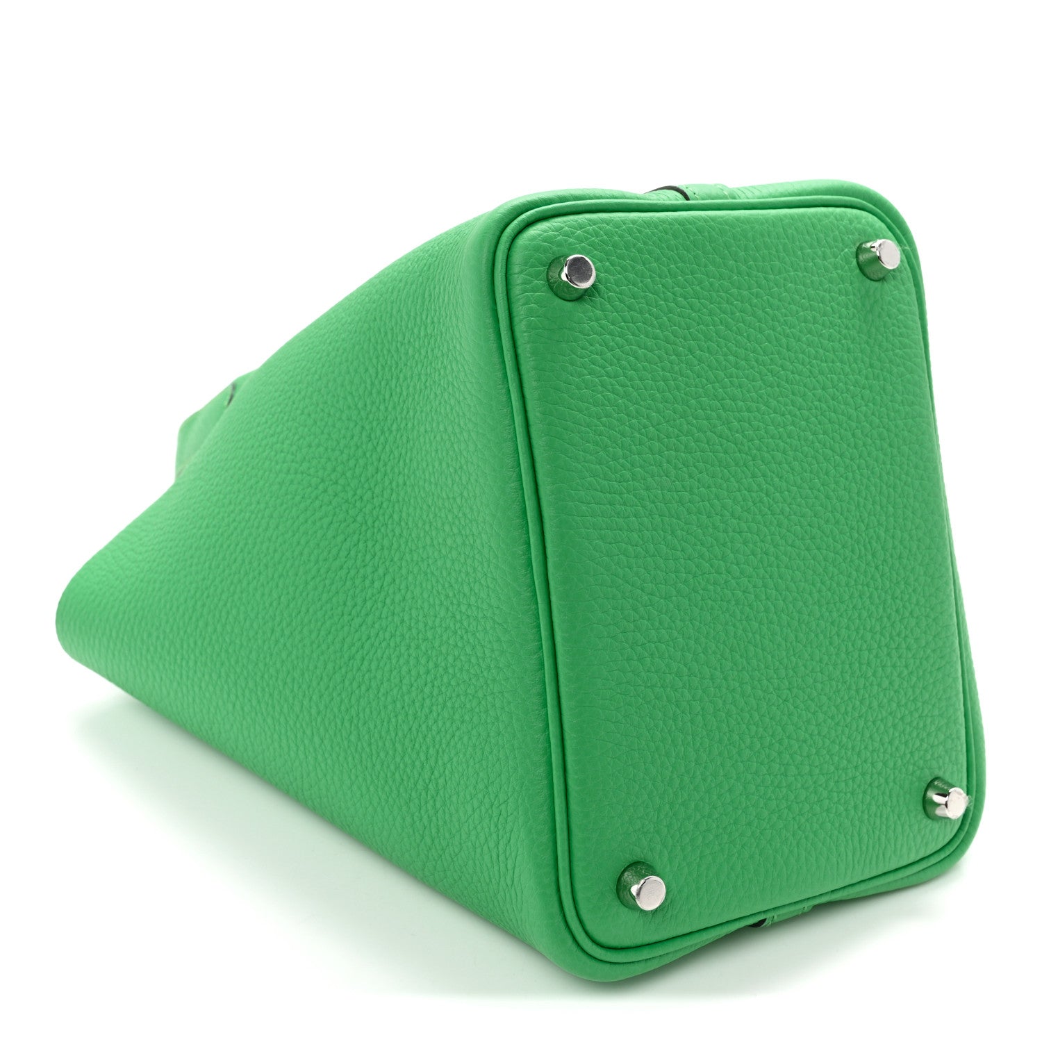 Green leather lock tote bag with corner studs and rounded side panel