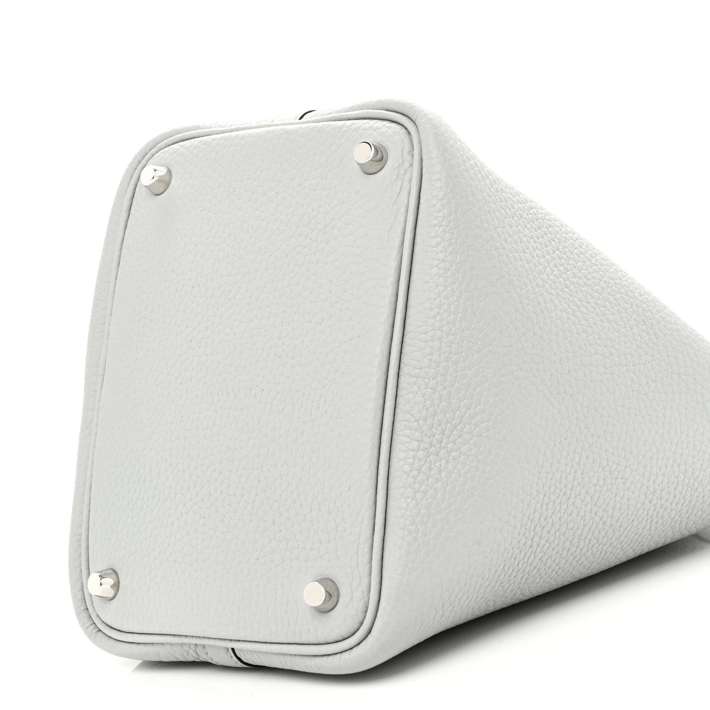 Light blue pebbled leather bucket bag side with rounded panel and metal corner studs