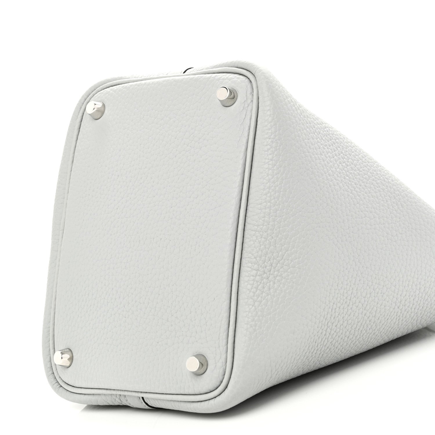 Light blue pebbled leather bucket bag side with rounded panel and metal corner studs