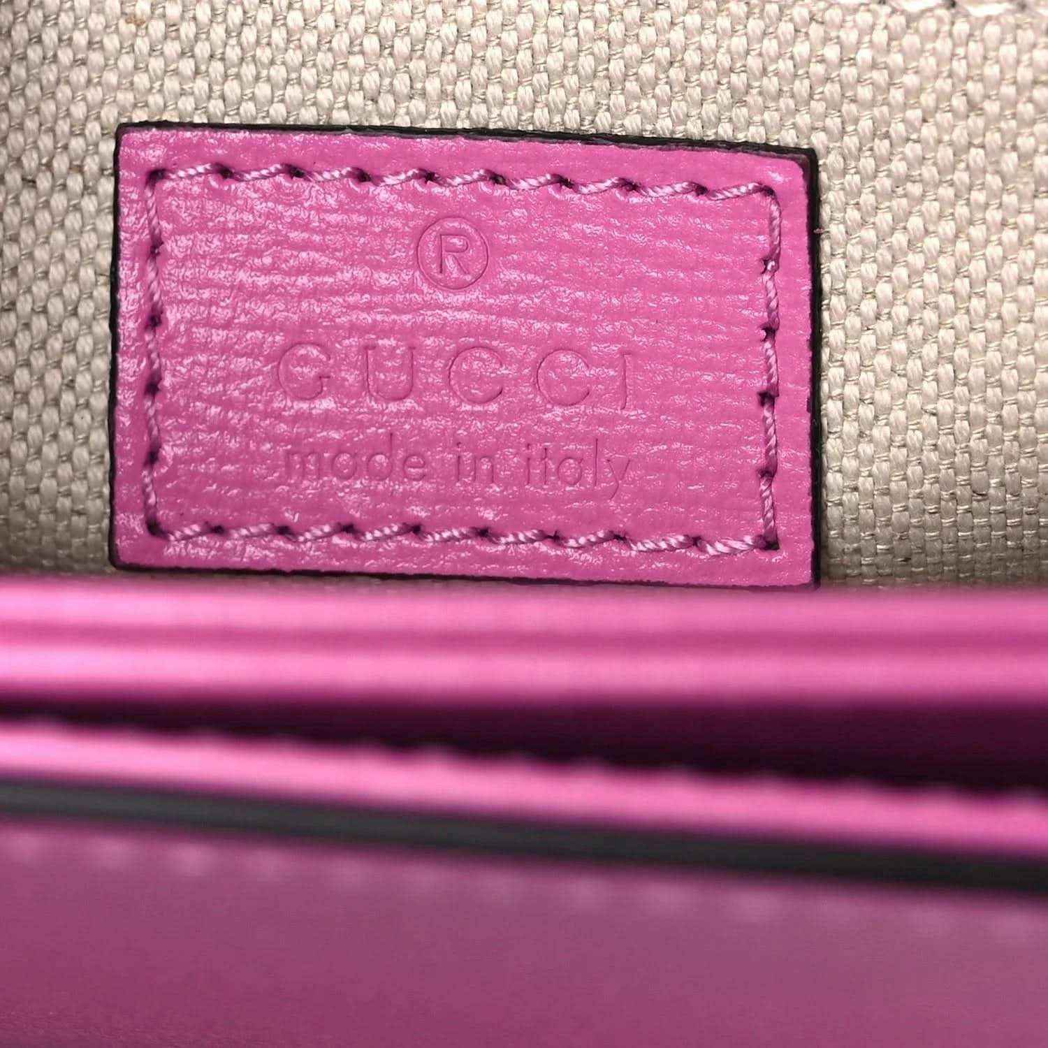 Gucci pink leather bag interior logo patch on fabric lining