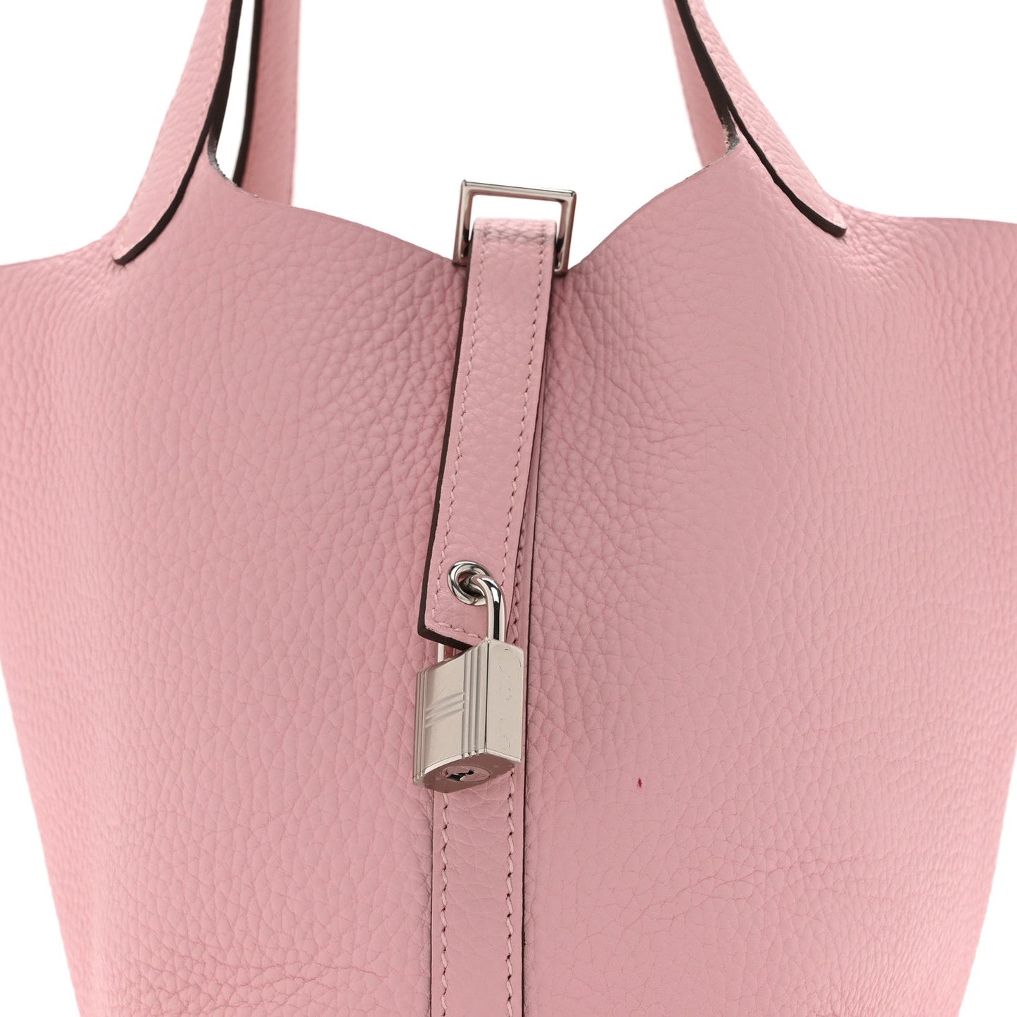Mauve leather handbag top handle with central padlock closure and metal ring