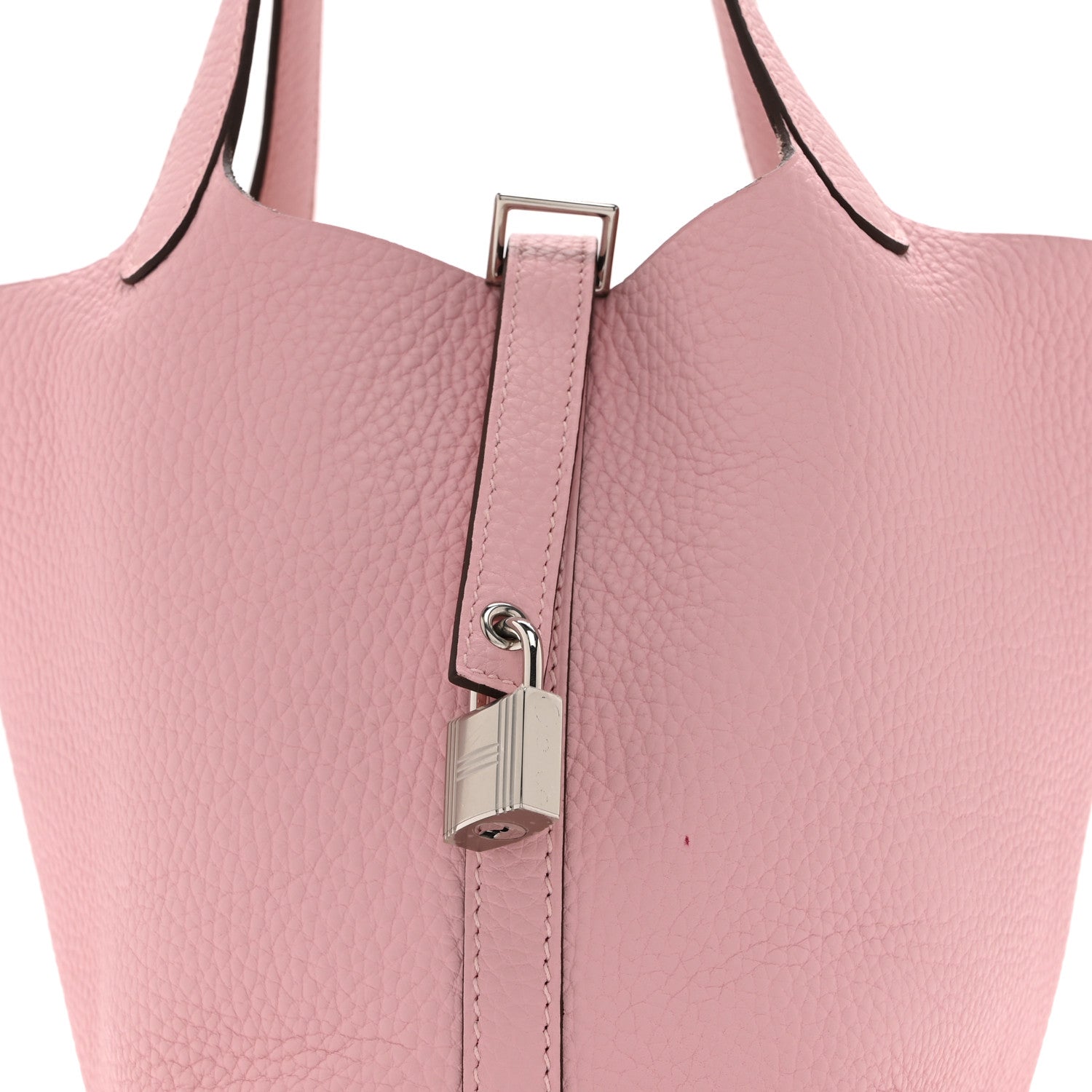 Mauve leather handbag top handle with central padlock closure and metal ring