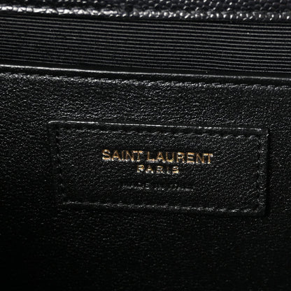 Black leather label patch reading “SAINT LAURENT PARIS” on satchel lining