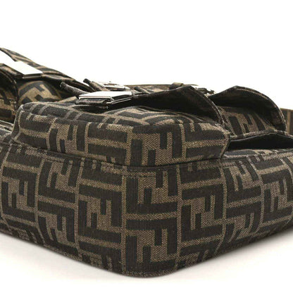 Fendi Zucca canvas baguette bag side panel with buckle detail, dark brown FF print.