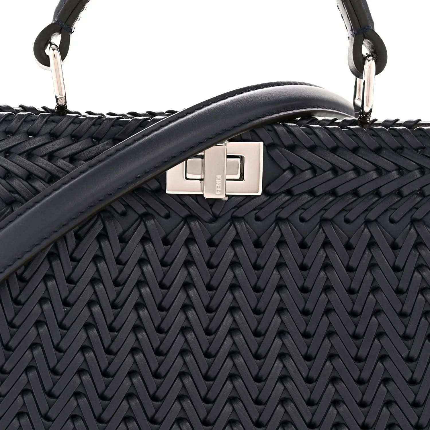 Midnight blue leather satchel with silver front clasp and woven chevron texture