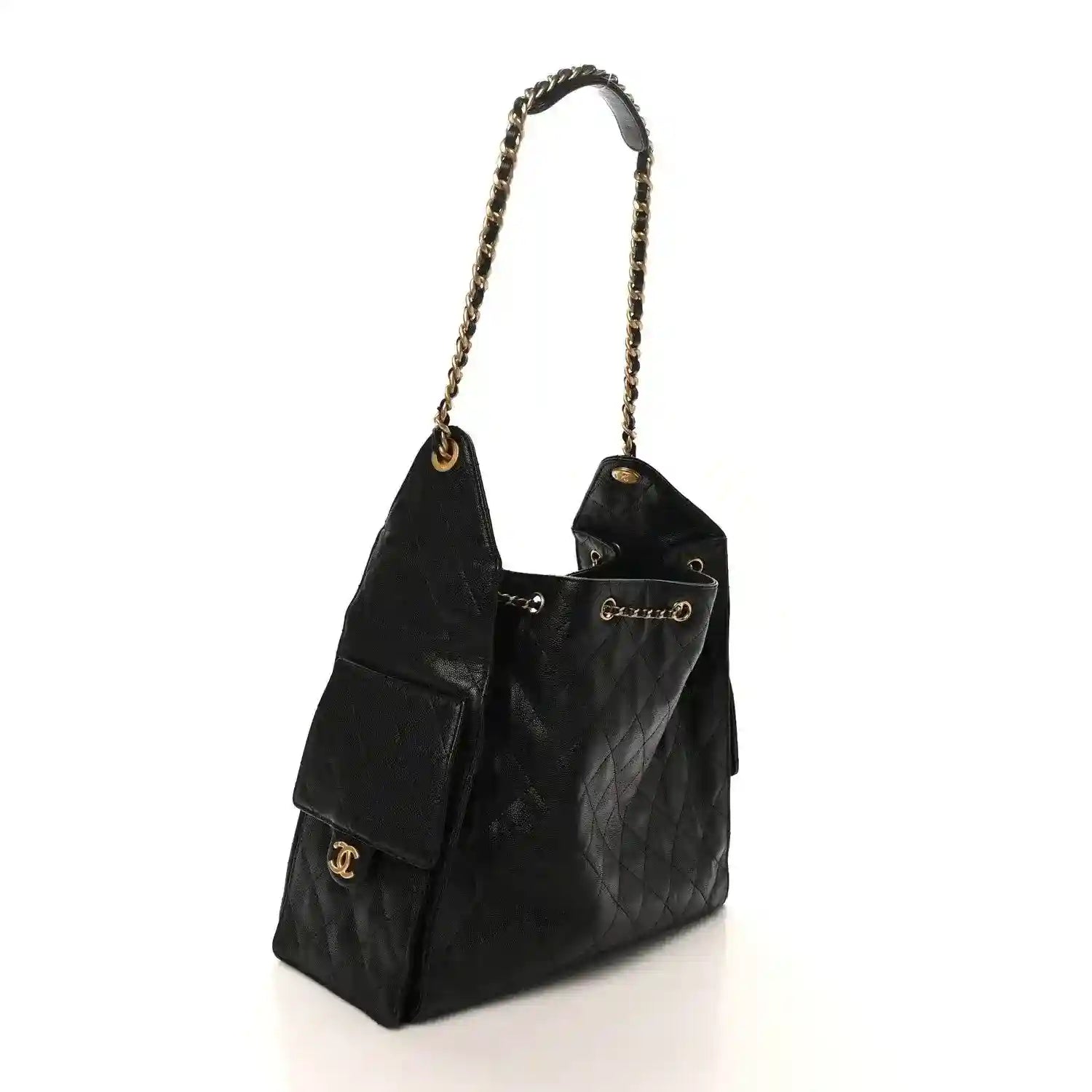 Black Chanel leather tote with gold chain strap, quilted panels, and CC logo