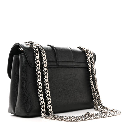 Black leather shoulder bag with front flap, chain strap, and silver clasp