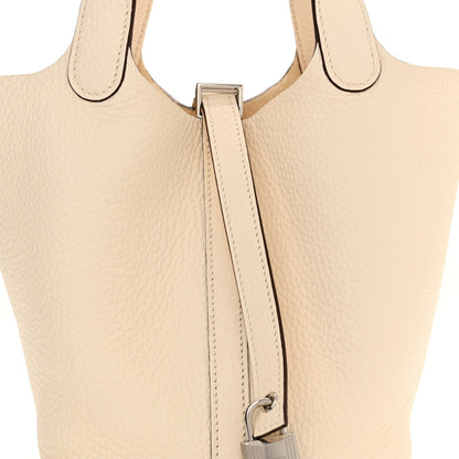 Nata leather handbag top with double handles and central lock strap hardware