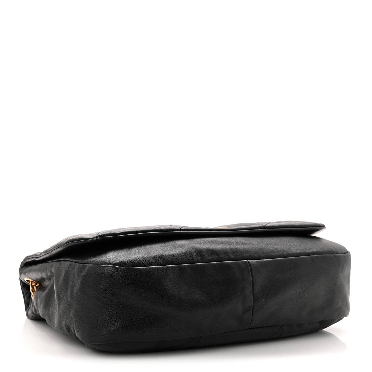 Black quilted lambskin shoulder bag side view with rolled top edge and gold hardware